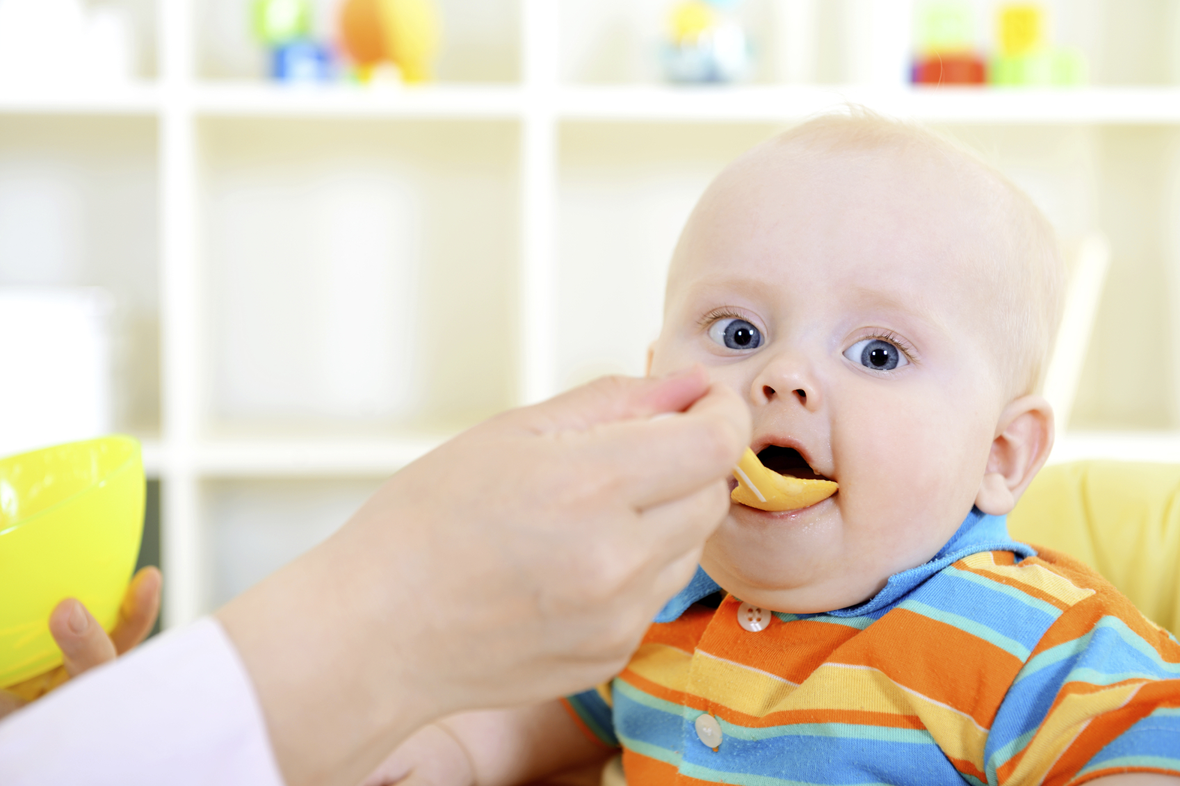 baby eating rice